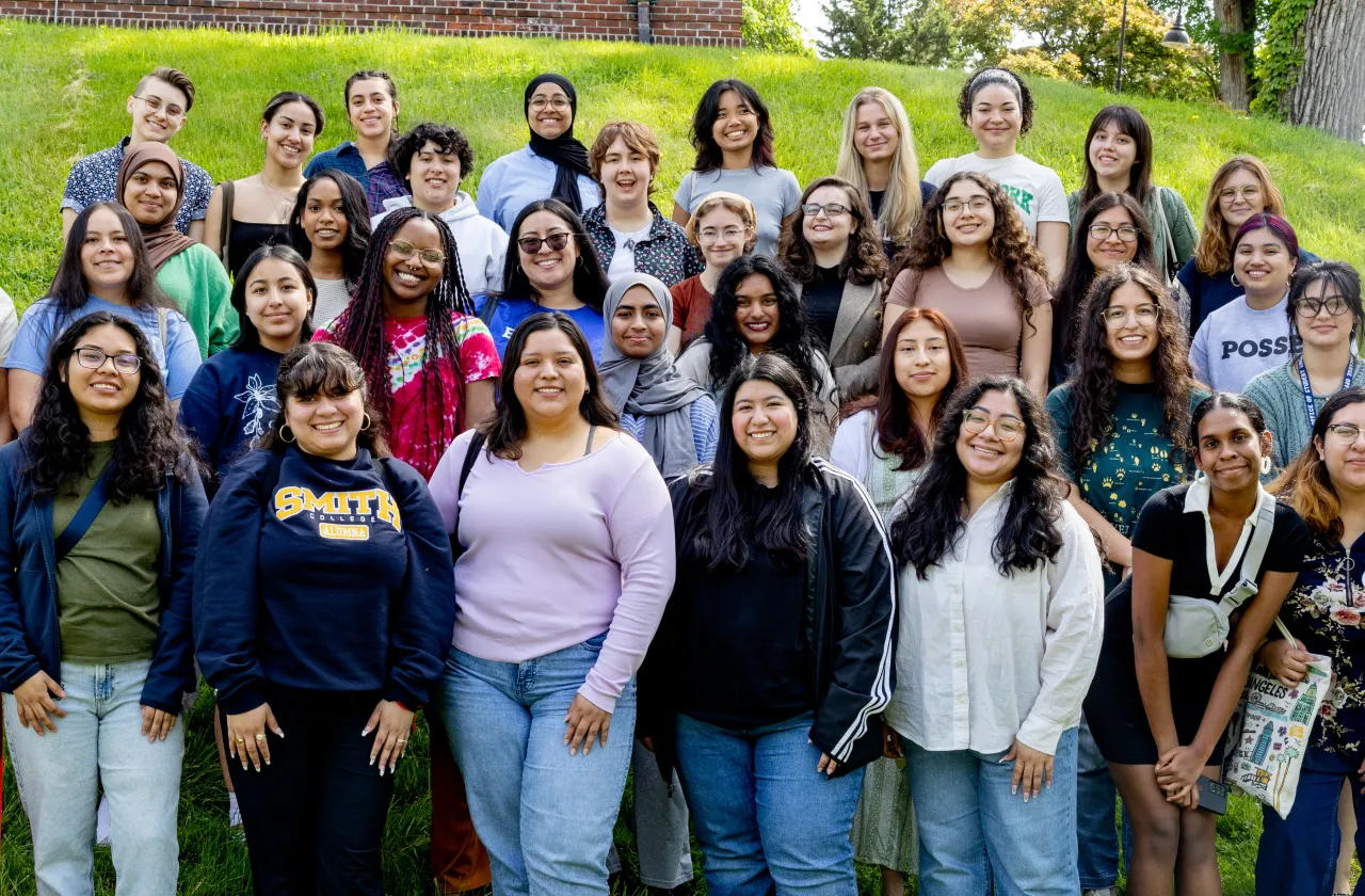 A group of students gathered at commencement rehearsal.