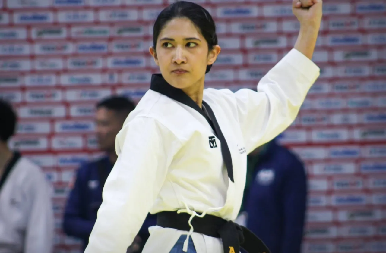 Aahana Mulchandani '28 strikes a pose while performing the martial art poomsae at an international competition