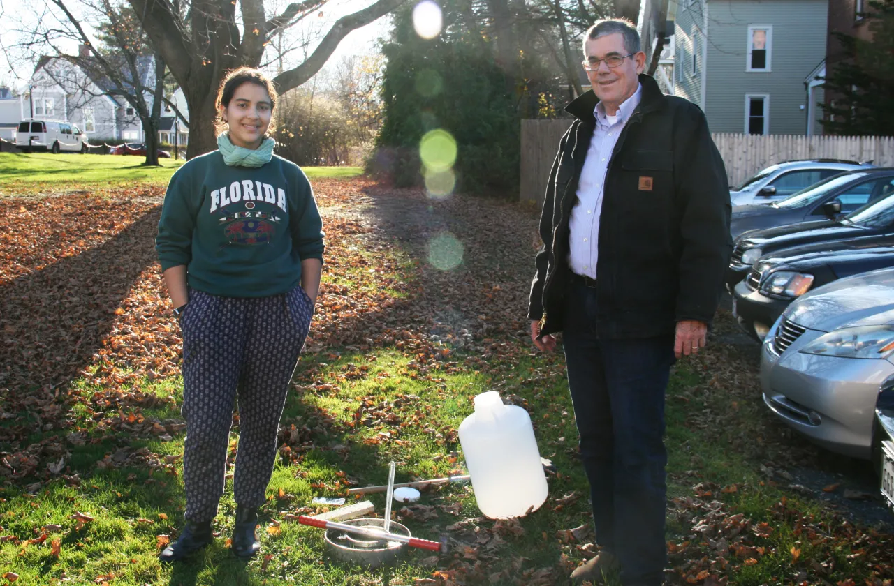 Professor and student outside