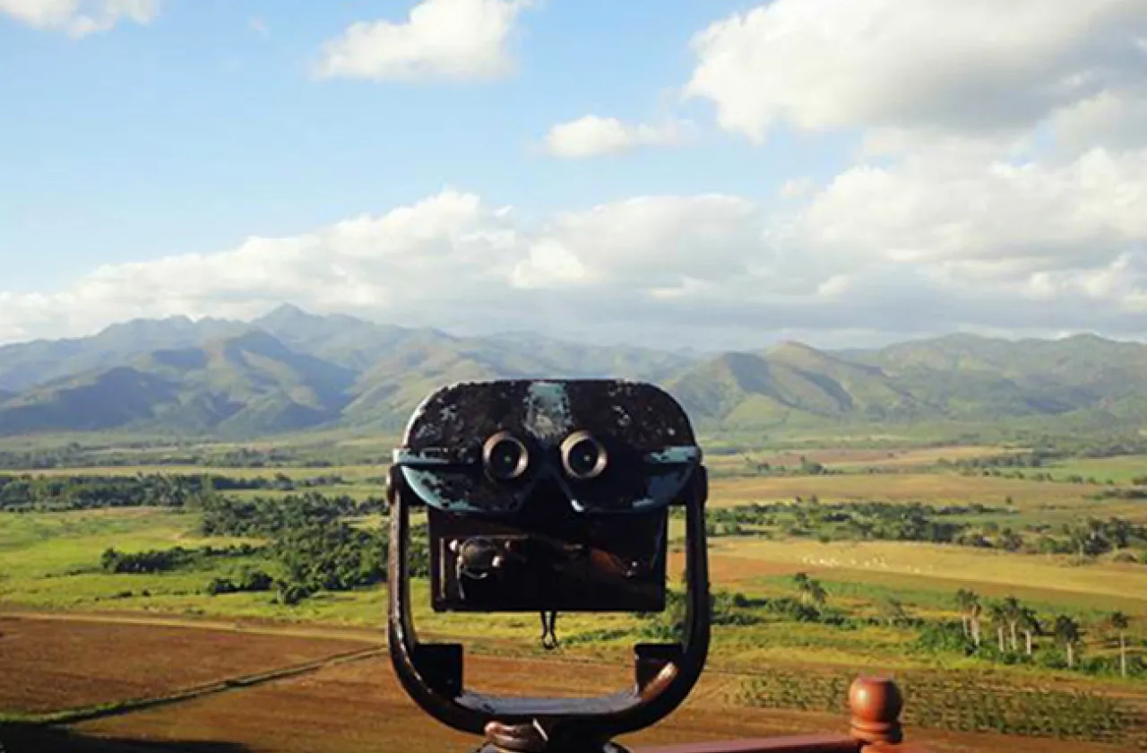 Tourist binoculars overlooking a view of the valley