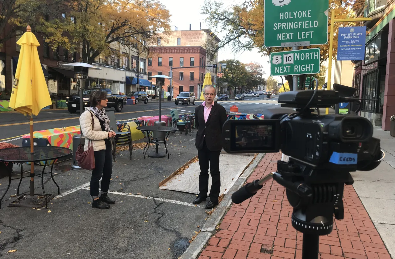 Maria Succi-Hempstead and Frank Sleegers in downtown Northampton, recording a film dialouge