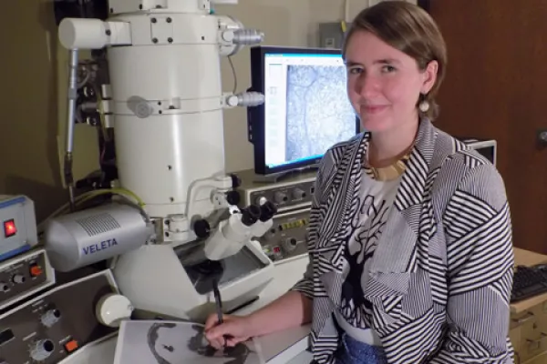 Anja Nordstrom with large scientific instrument
