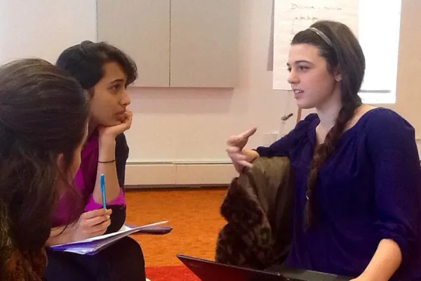 Smith students (from left) Molly Kover '17, Sadaf Ahmad '17 and Madeline Undis '18 are deep in French conversation during their Interterm class, Speaking (Like the) French. Photo by Dia Roth '15.