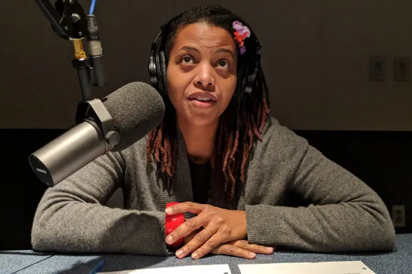 Lori Tharps at the microphone