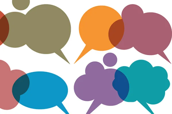 A gathering of many multi-colored speech bubbles.