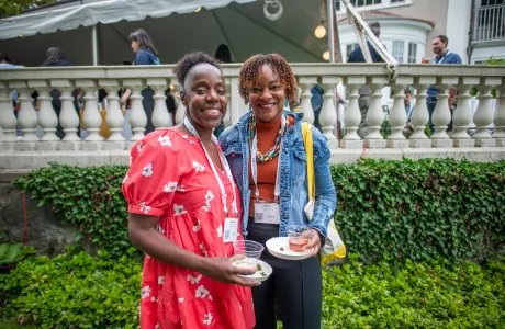 Two Smithies smile at the camera during Reunion