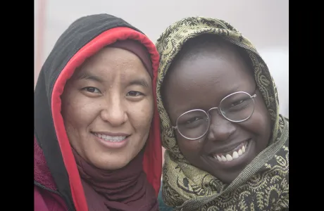 Student posing with nun