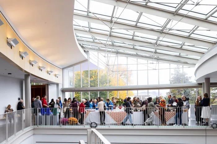 A large group of people gathered in the Campus Center atrium for the luncheon celebrating President Willie-LeBreton.