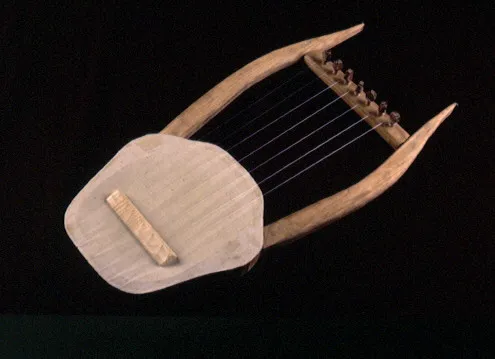 A simple, ancient lyre with a wooden frame and seven strings