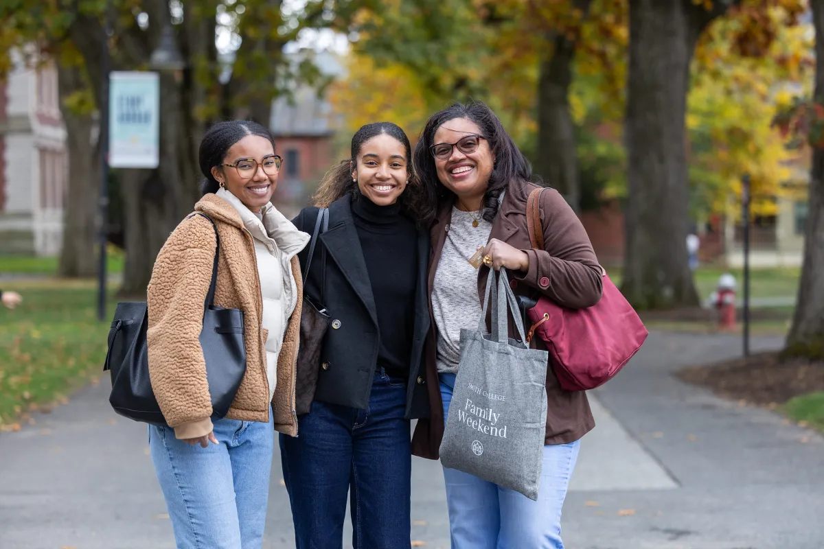 A family poses during Family Weekend.