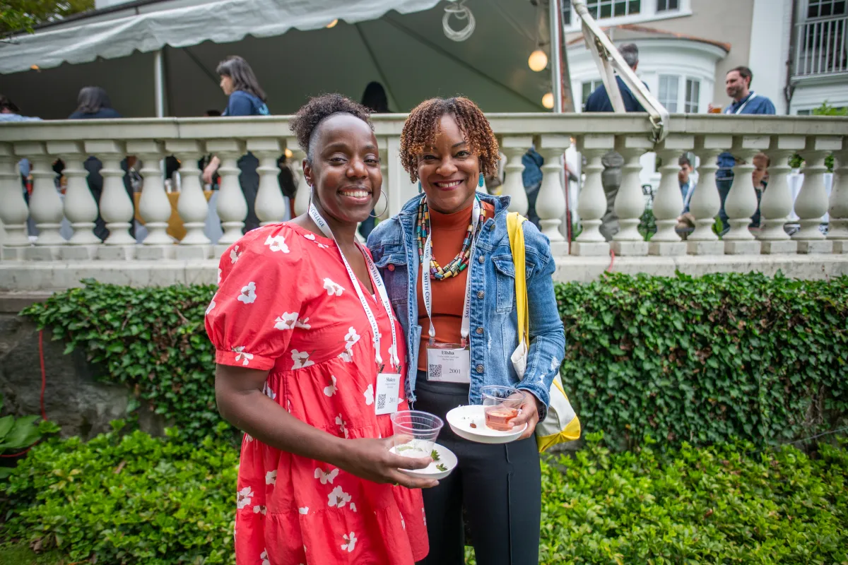 Two Smithies smile at the camera during Reunion