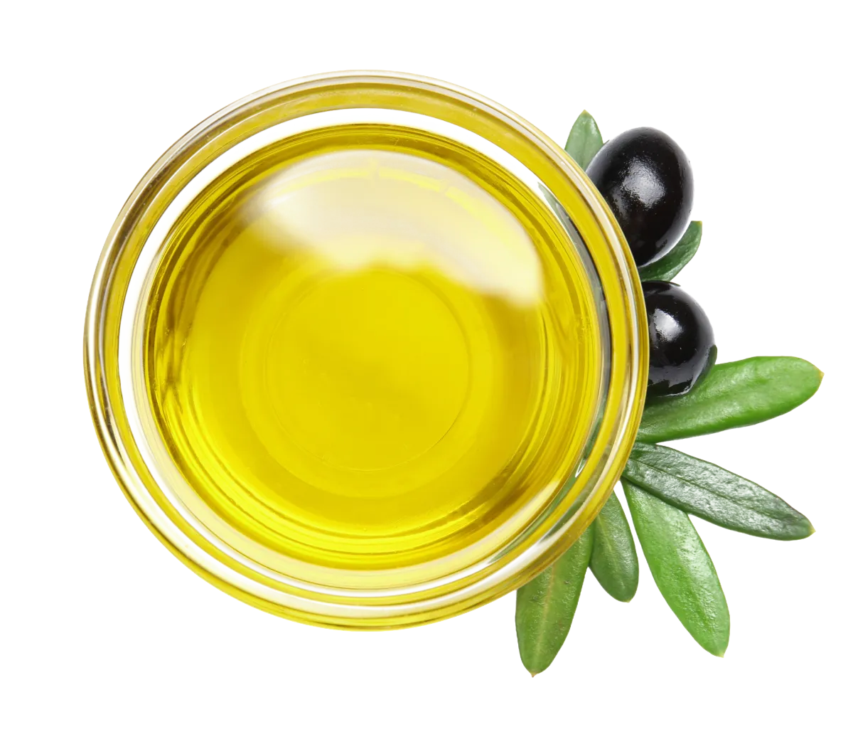 Top-down view of a small glass bowl filled with golden olive oil, garnished with two black olives and green leaves.