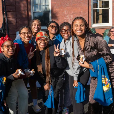 Students smile in a group on Mountain Day 2023